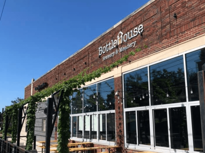 A brick exterior of a bar.